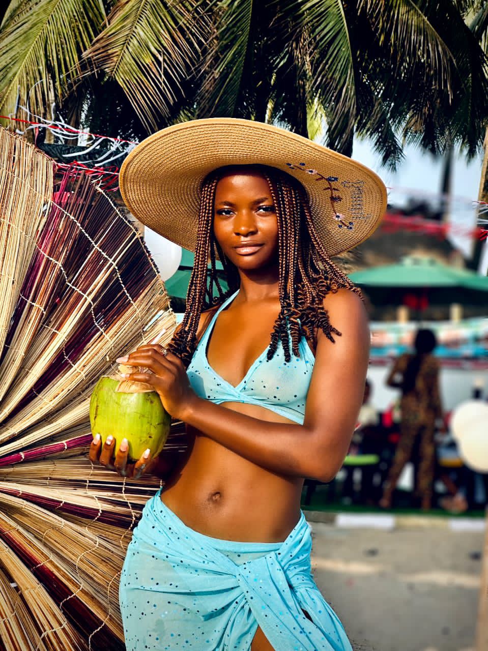 Tourist with coconut